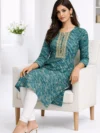 teal-abstract-printed-rayon-straight-kurti-2.webp
