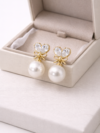 gold-bow-pearl-drop-earrings-3.png