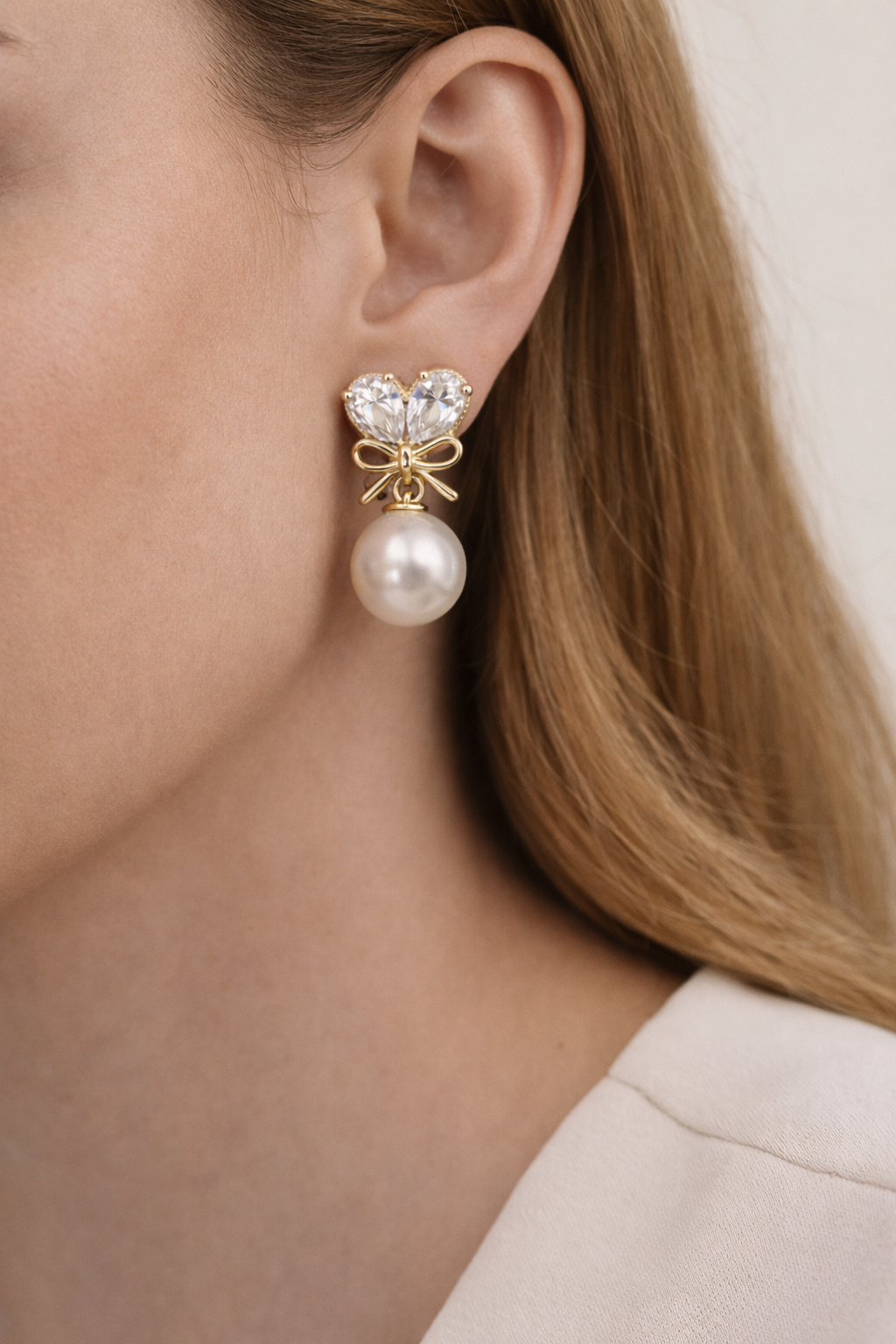 gold-bow-pearl-drop-earrings-4.png