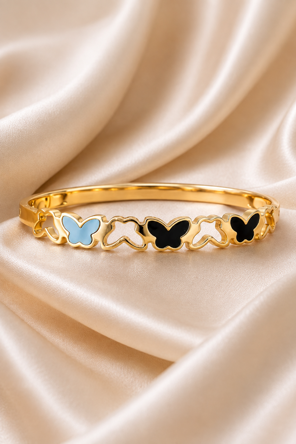 gold-enamel-butterfly-cutwork-bracelet-1.png