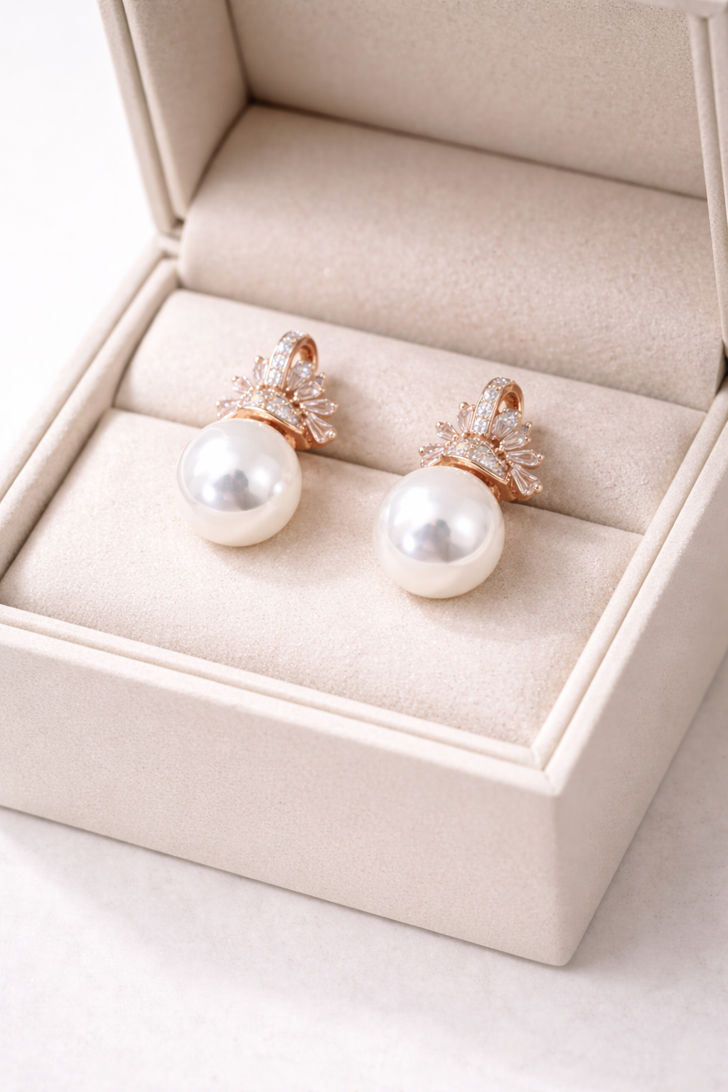 rose-gold-pearl-crown-stud-earrings-3.png